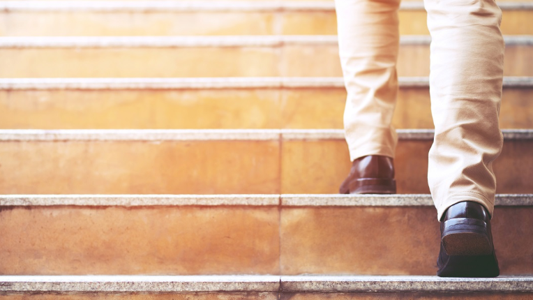 Person walking up stairs